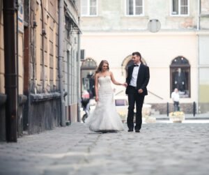 beautiful elegant couple walking street